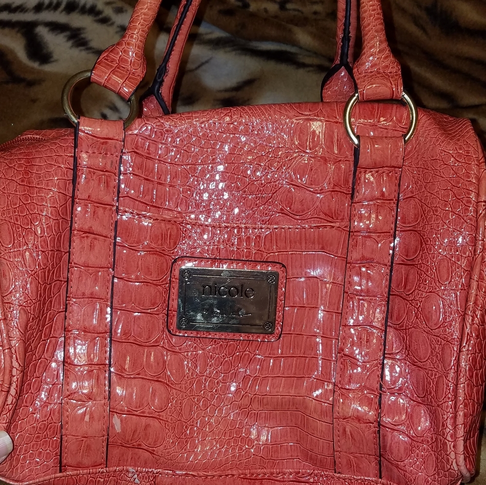 Beautiful Nicole Miller purse.

Please go to my pa - Picture 2 of 5